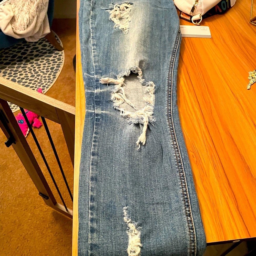 Extremely distressed jeans 12